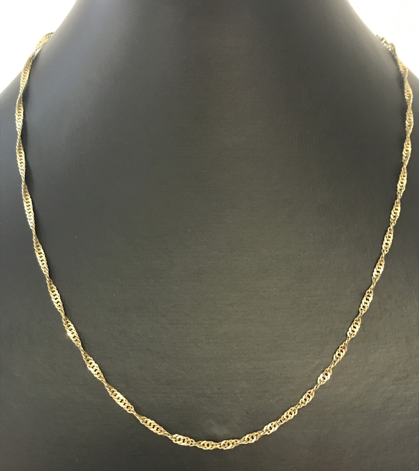 A 9ct gold Singapore style chain, approx. 18" long.