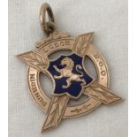 A 9ct gold "Dunedin Lodge S.O.O" medallion with enamelled shield & rampant lion decoration.