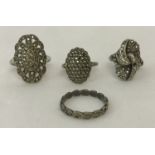 4 vintage silver dress rings all set with marcasite stones.
