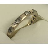 A vintage 9ct gold and clear stone full eternity ring.