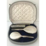 A ladies cased vintage Spritzer & Fuhrmann silver backed vanity set.