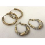 2 pairs of 9ct gold hoop earrings. A pair of twist design duo colour gold hoops.