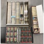 A large collection of assorted trading cards.