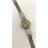 A ladies vintage Ingersol wristwatch with replacement stainless steel mesh strap.