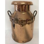 An antique copper 2 handled 'Hunts Dairies, Sherborne', milk churn with embossed name to sides.