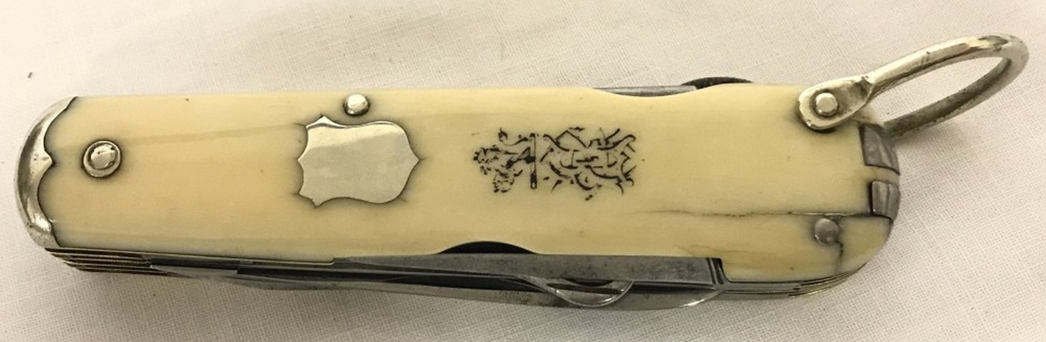 A vintage pocketknife/multi tool by Asprey of London.