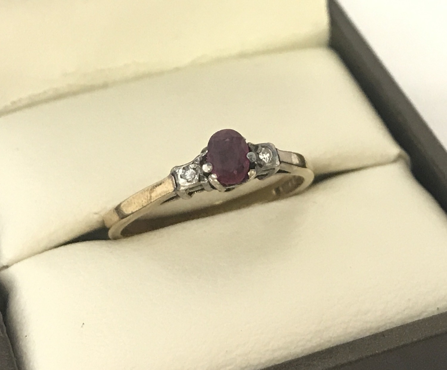 A vintage 9ct gold ruby and diamond dress ring.