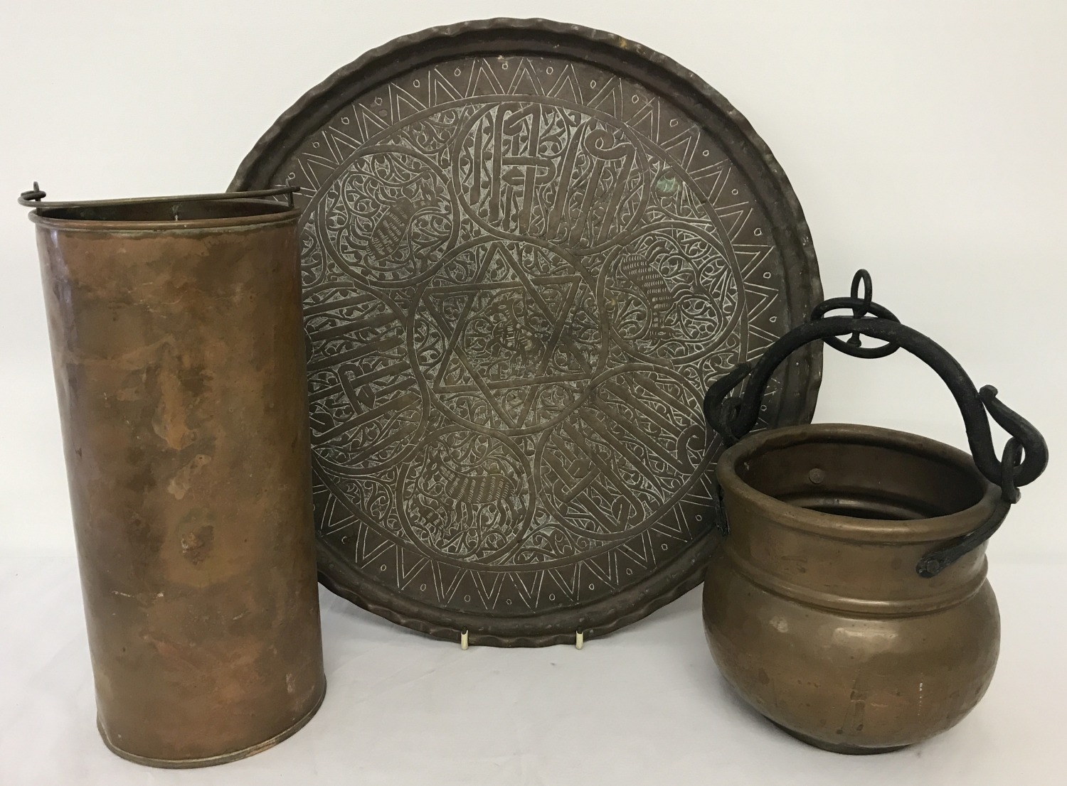 A decorative copper tray together with 2 vintage copper pots.