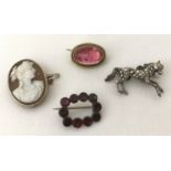 4 vintage brooches comprising: a white metal horse brooch set with marcasite stones,