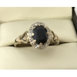 A vintage 9ct gold sapphire and diamond dress ring.