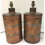 A pair of metal lamp bases made from Indian Tiffin pots.