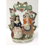 A large Staffordshire flat back figurine, The Fortune Teller.