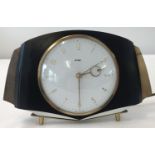 A vintage electric Metamec mantel clock.
