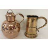An antique copper Guernsey cream jug together with a wooden based tankard.