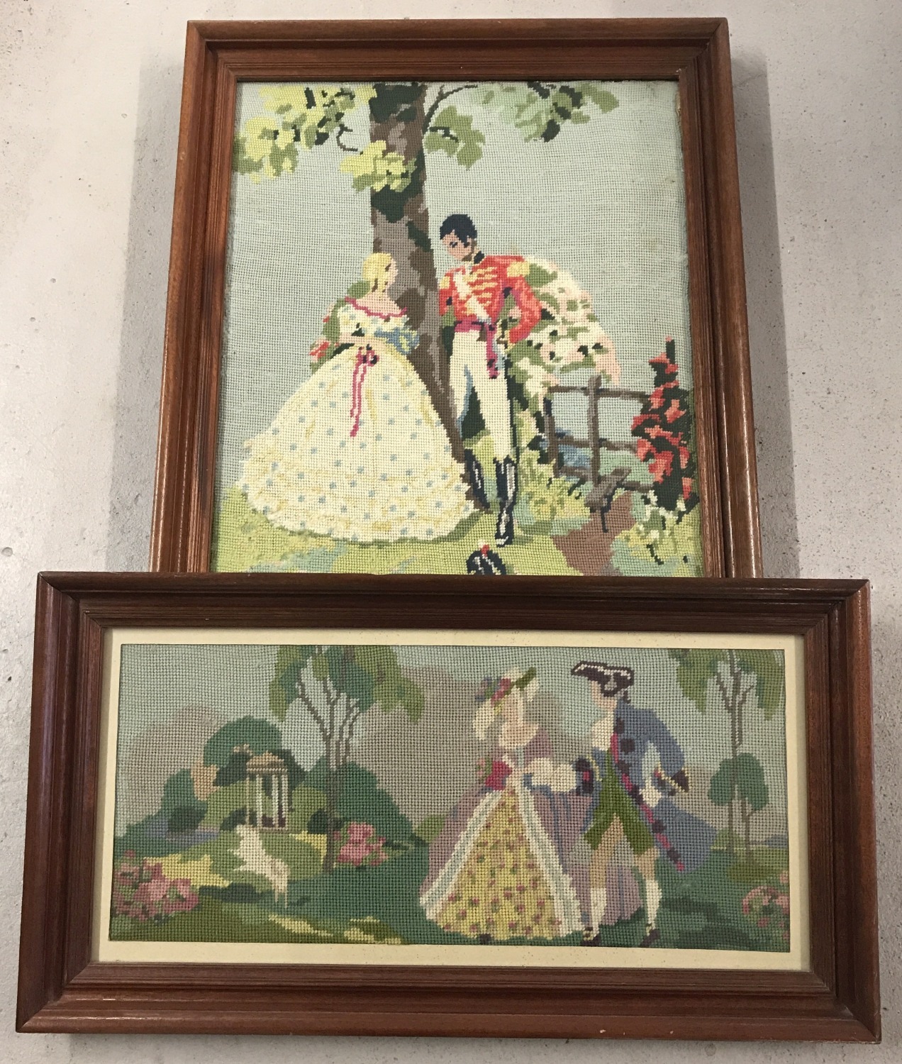 2 framed and glazed tapestry pictures. Both depicting couples in period dress.