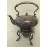 An early 20th century silver plated spirit kettle with engraved detail to kettle body.