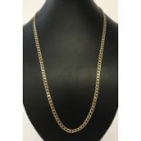 A 9ct gold curb chain with lobster clasp. Approx. 22" long.