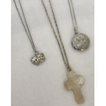 3 decorative silver necklaces.