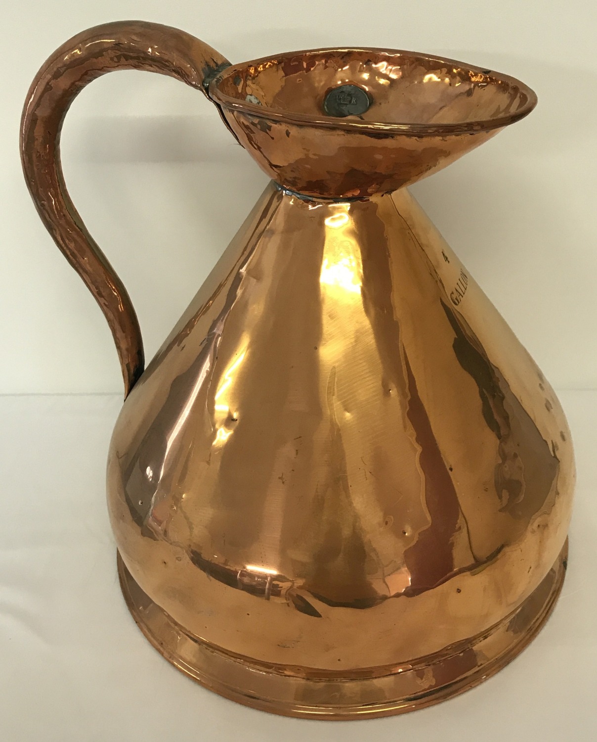 A large Victorian copper 4 gallon haystack jug with leaded VR stamp.