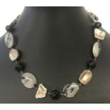 A 925 silver, black glass bead and dendritic quartz necklace by Pom.