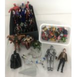 A quantity of assorted action figures, space ships and accessories.