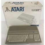 A 1980's Atari 520ST in original box with polystyrene interior packaging.
