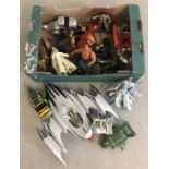 A box of assorted toys and action figures to include LOTR, DC and Marvel.