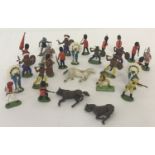A quantity of vintage Britains plastic figures and animals.