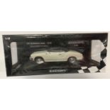 A boxed 1:18 scale, limited edition VW Karmann Ghia-1970, by Minichamps.