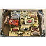 A box containing 25 boxed Lledo diecast vehicles.