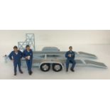 An unboxed 1:18 scale diecast car trailer with ramps and racks with Gulf decals by GMP.