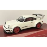 A 1:18 scale diecast model of a GT Spirit RWB 964 Hoonigan.