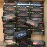 A box containing 26 assorted Onyx F1 boxed collectors racing car models from the 1991 & 92 seasons.