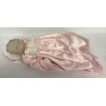 An Ashton Drake "My Princess" sleeping baby doll by Joyce Wolfe.