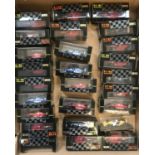 A box containing 26 assorted Onyx F1 boxed collectors racing car models from the 1991 & 92 seasons.