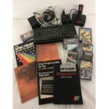 A 1980's Sinclair ZX Spectrum+ computer bundle to include power leads, manuals, joy stick & games.