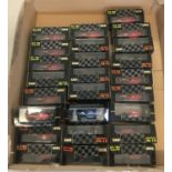 A box containing 25 assorted Onyx F1 boxed collectors racing car models from the 1991 & 92 seasons.