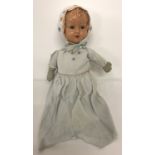 A vintage Palitoy doll with Playtex head and cloth body.