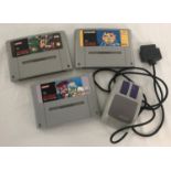 3 unboxed Super Nintendo SNES games cartridges; Tazmania, Animaniacs and Mario Paint.