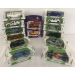 14 boxed Corgi diecast vehicles; 12 from the Mobil Performance Car Collection and 2 Cadburys.