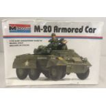 A vintage sealed, unopened and unassembled plastic model kit of M-20 Armored Car by Monogram.