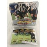 A full box of 24 packs of sealed and unopened Football Champions trading cards.