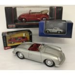 3 boxed and 1 unboxed diecast collectors cars.