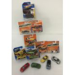 A collection of Matchbox, Hot wheels and Realtoy diecast cars, some in original blister packs
