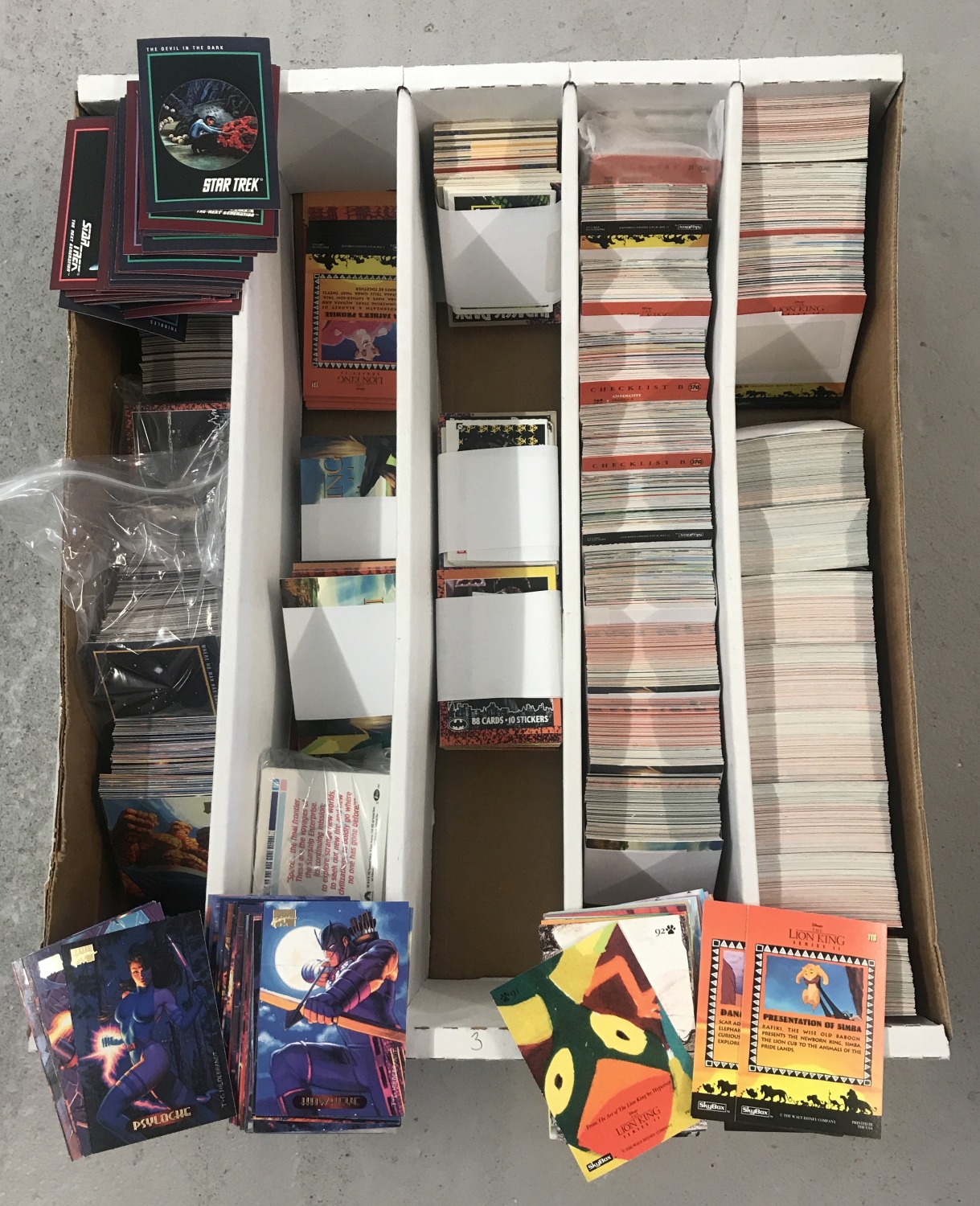 A quantity of assorted trading cards.