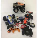 A box of assorted battery operated remote control vehicles.