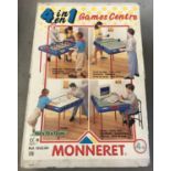A 4 in 1 games table and accessories by Monneret.