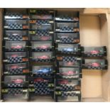 A box containing 26 assorted Onyx F1 boxed collectors racing car models from the 1991 & 92 seasons.