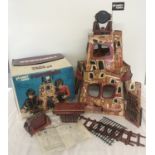 A vintage 1970's Mego Planet of the Apes Fortress, in original box and with instructions.