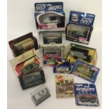 A box containing 14 boxed diecast vehicles to include Corgi, Matchbox and Burago.